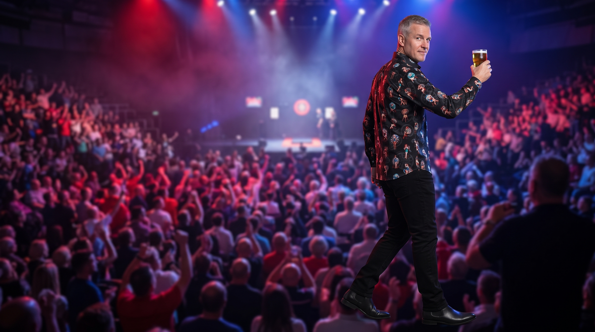 What to wear to the darts: a fan raising a pint in the Claudio Lugli Dartboard Pinup print shirt in a packed darts arena under red and blue stage lights