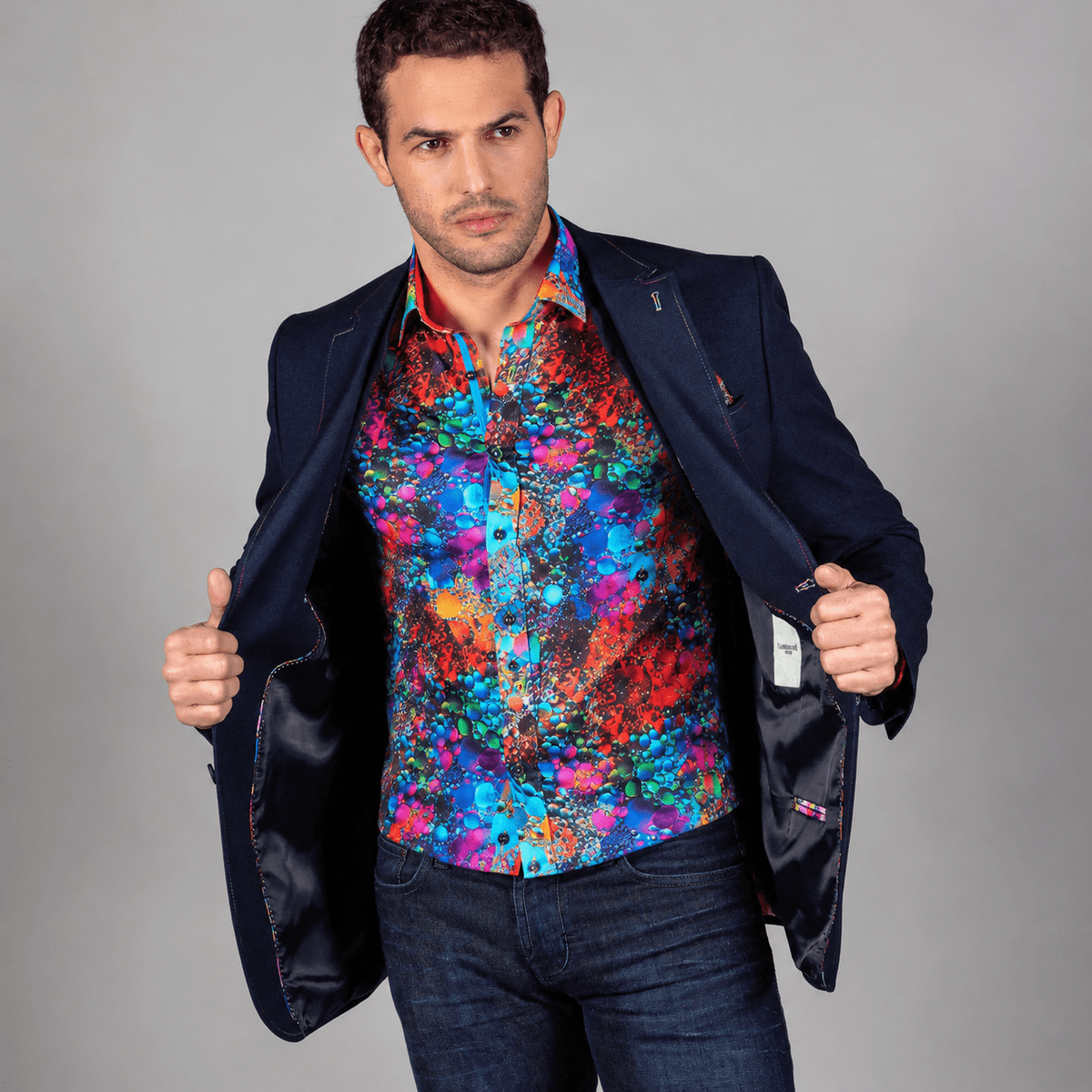 A London designed men's fitted jacket, detail led and distinctive from the shoulder to the cuff.