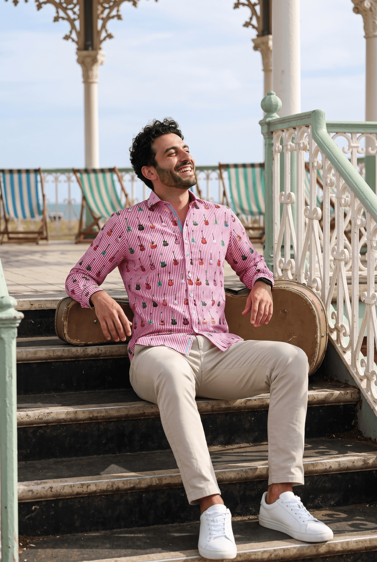 The Stripe Guitar print shirt at £60, in fuchsia, navy and blue, across nine sizes up to 6XL.