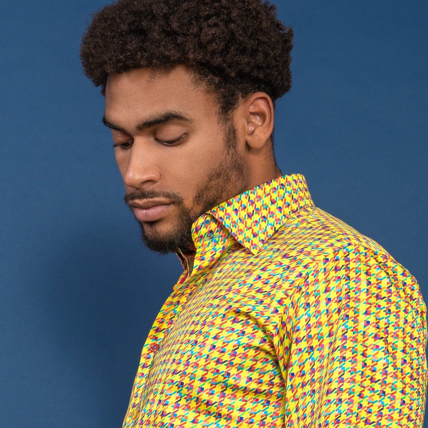 Houndstooth multicolour printed shirt by Claudio Lugli showcasing vibrant and playful colours on a model