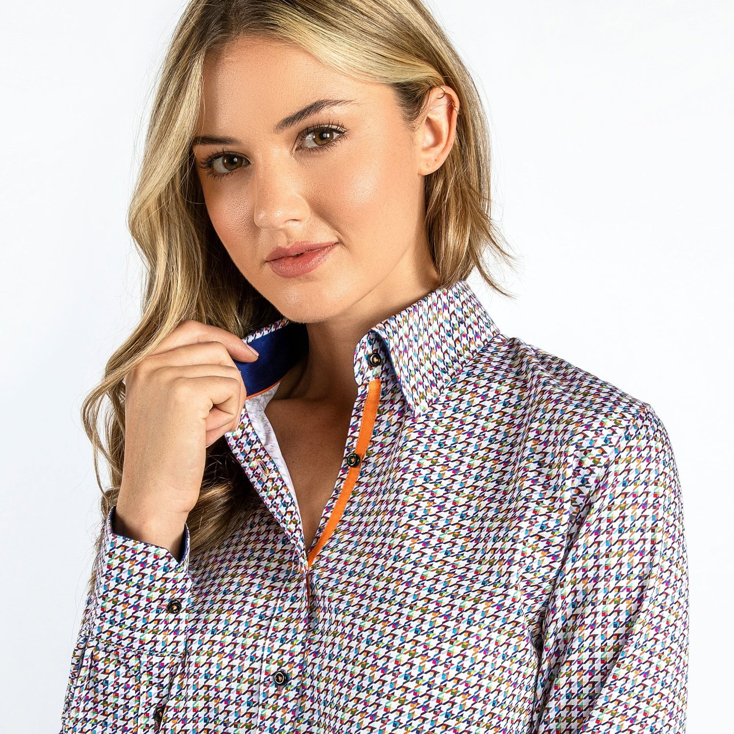 Woman wearing Multicolour Houndstooth Women's Printed Shirt with vibrant colors and classic pattern, featuring a satin-cotton blend fabric.