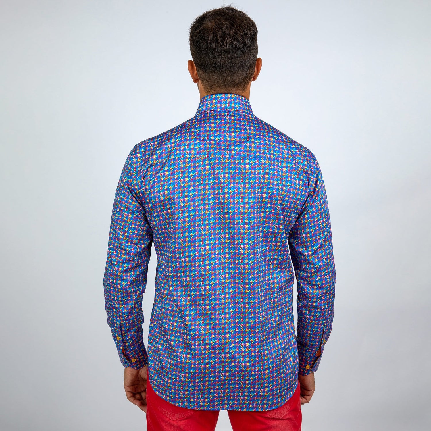 Back view of a man wearing a Houndstooth Multicolour Printed Shirt by Claudio Lugli, showcasing the vibrant pattern and sleek satin cotton finish.