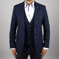 Man wearing navy fitted jacket with multicolour stitching and stylish design details, paired with a navy vest and white shirt