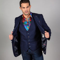 Man wearing navy Signature Fitted Jacket with multicolour stitching, showing inside lining. Stylish men's jacket for music and party themes.