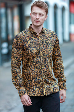 Claudio Lugli Baroque Dynasty Print Shirt, gold and black ornamental print shirt worn outdoors, front view