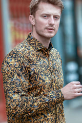 Claudio Lugli Baroque Dynasty Print Shirt, gold and black ornamental print shirt worn outdoors, side view
