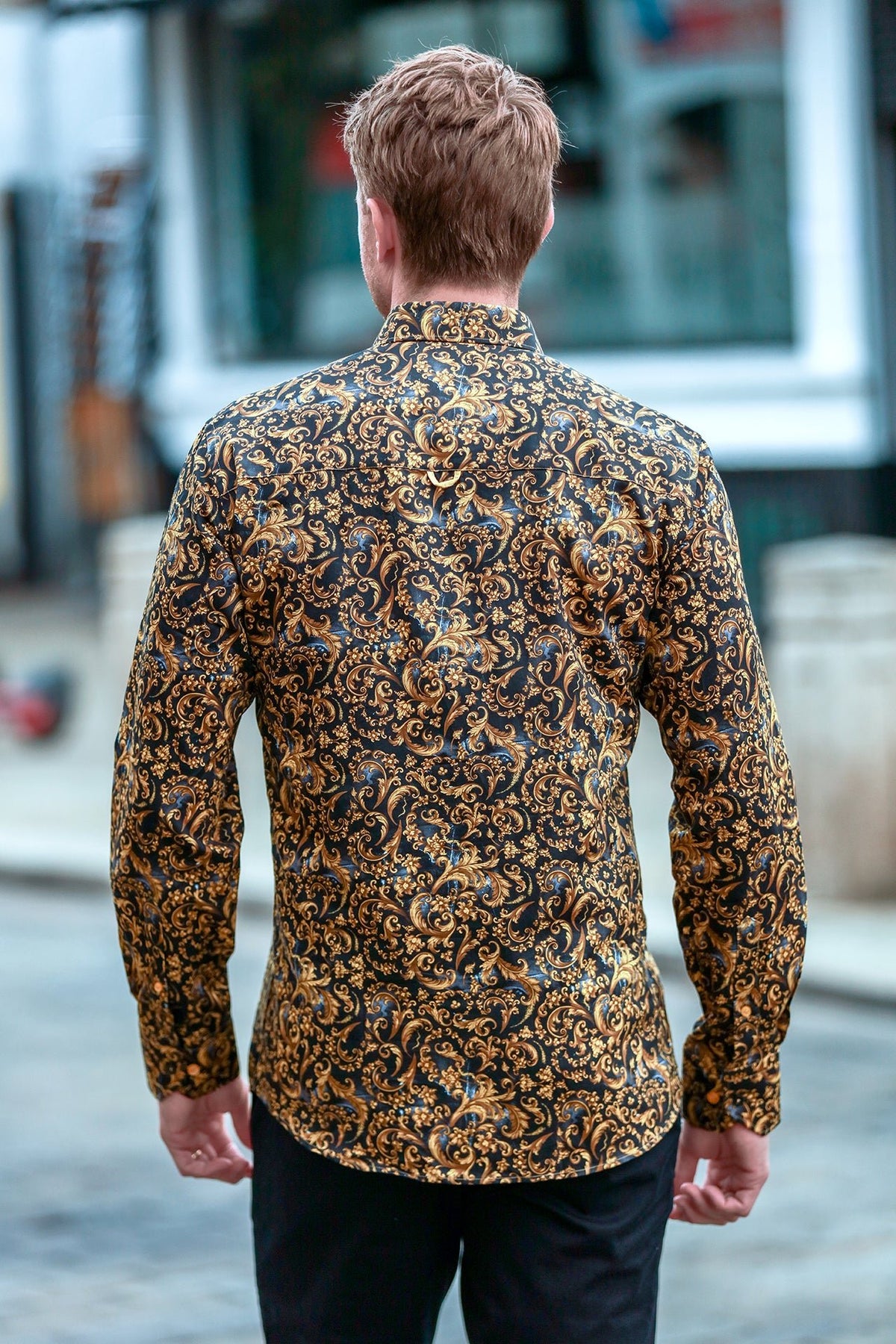 Claudio Lugli Baroque Dynasty Print Shirt, gold and black ornamental print shirt worn outdoors, rear view