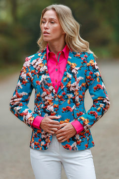 Claudio Lugli Enchanted Garden Print Blazer, aqua floral blazer with coral and ivory blossom worn over a pink shirt, front view