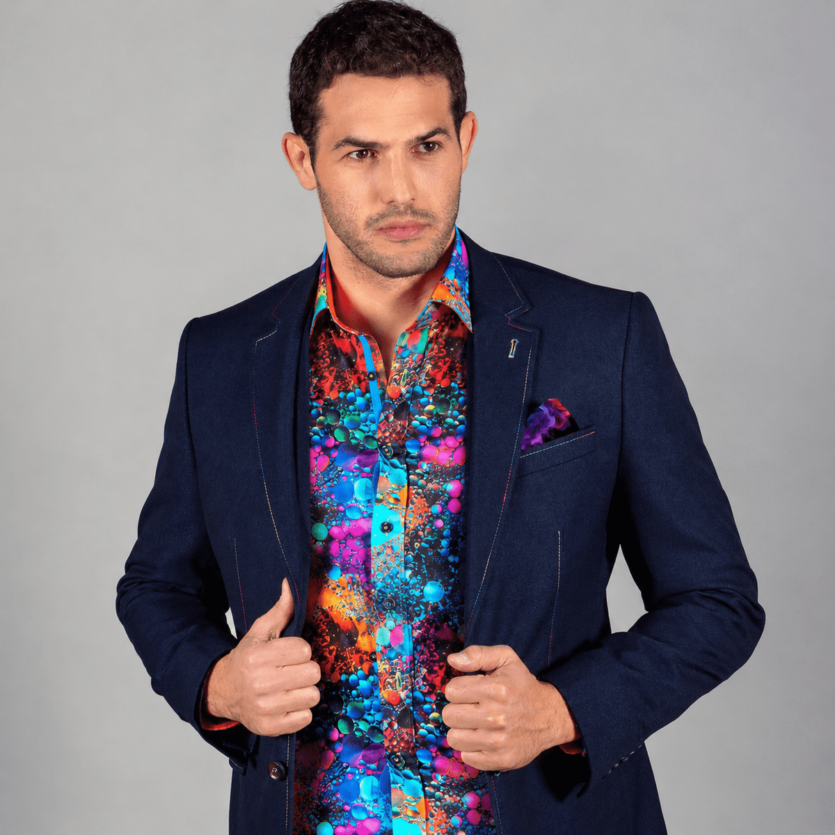 Worn over a plain shirt or over a fine knit, the stitching does the talking without further pattern.