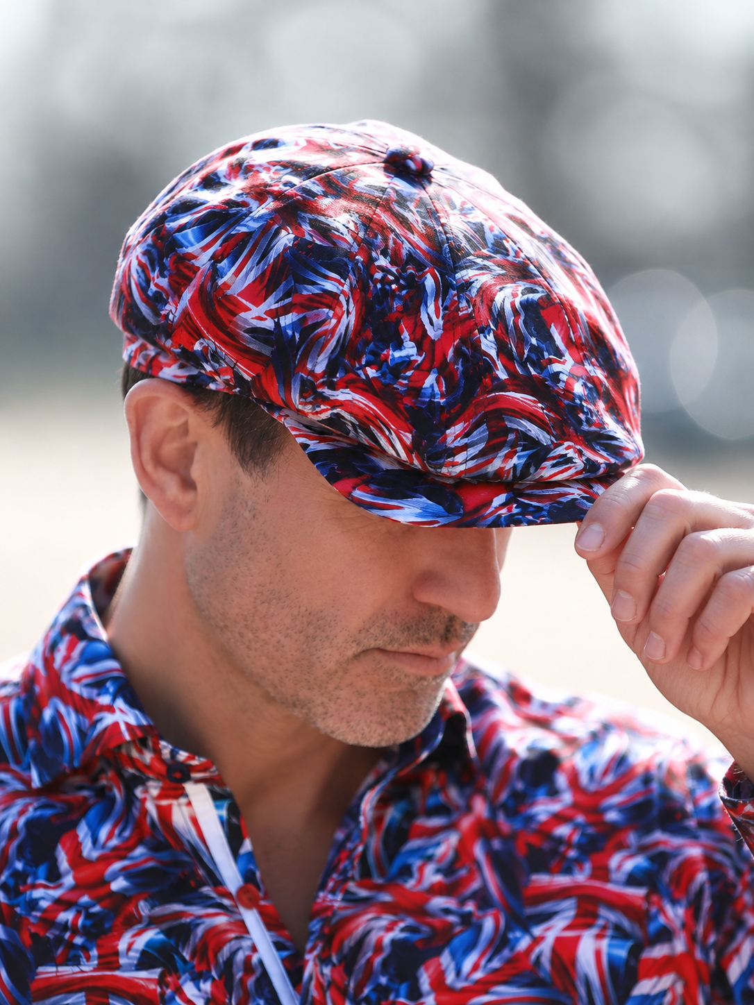 Claudio Lugli Union Jack Printed Button-Top Cap, red white and blue Union Jack button-top cap, adjusting peak outdoors